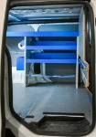 04_Dalla porta scorrevole, Expert rivestito e allestito da Syncro per edilizia