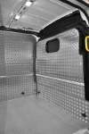 Copriparatia in alluminio mandorlato, pannelli laterali e pianale nel Transit