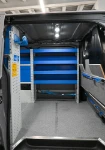 Copriparatia, scaffalatura e pianale con rotaia integrata nel Volkswagen Transporter
