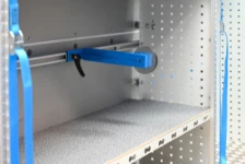 Navetta fermavaligie con leva a camma e tampone su rotaia Syncroblock
