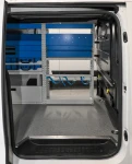 Scaffali nel Vivaro visti dalla porta laterale